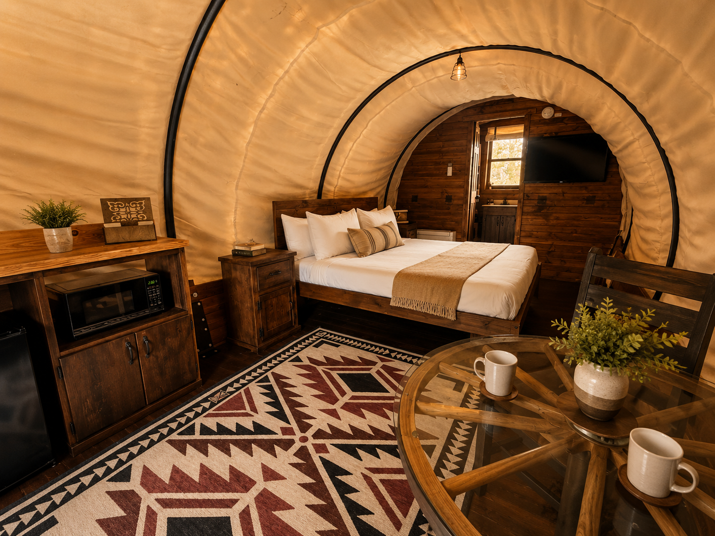 Riverfront covered wagon interior at The Amoretti Hotel in Dubois, Wyoming